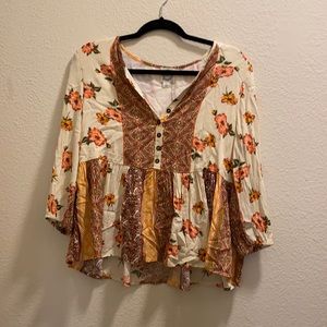 Never worn! 3/4 length sleeve babydoll style shirt from Francesca‘s. Size small